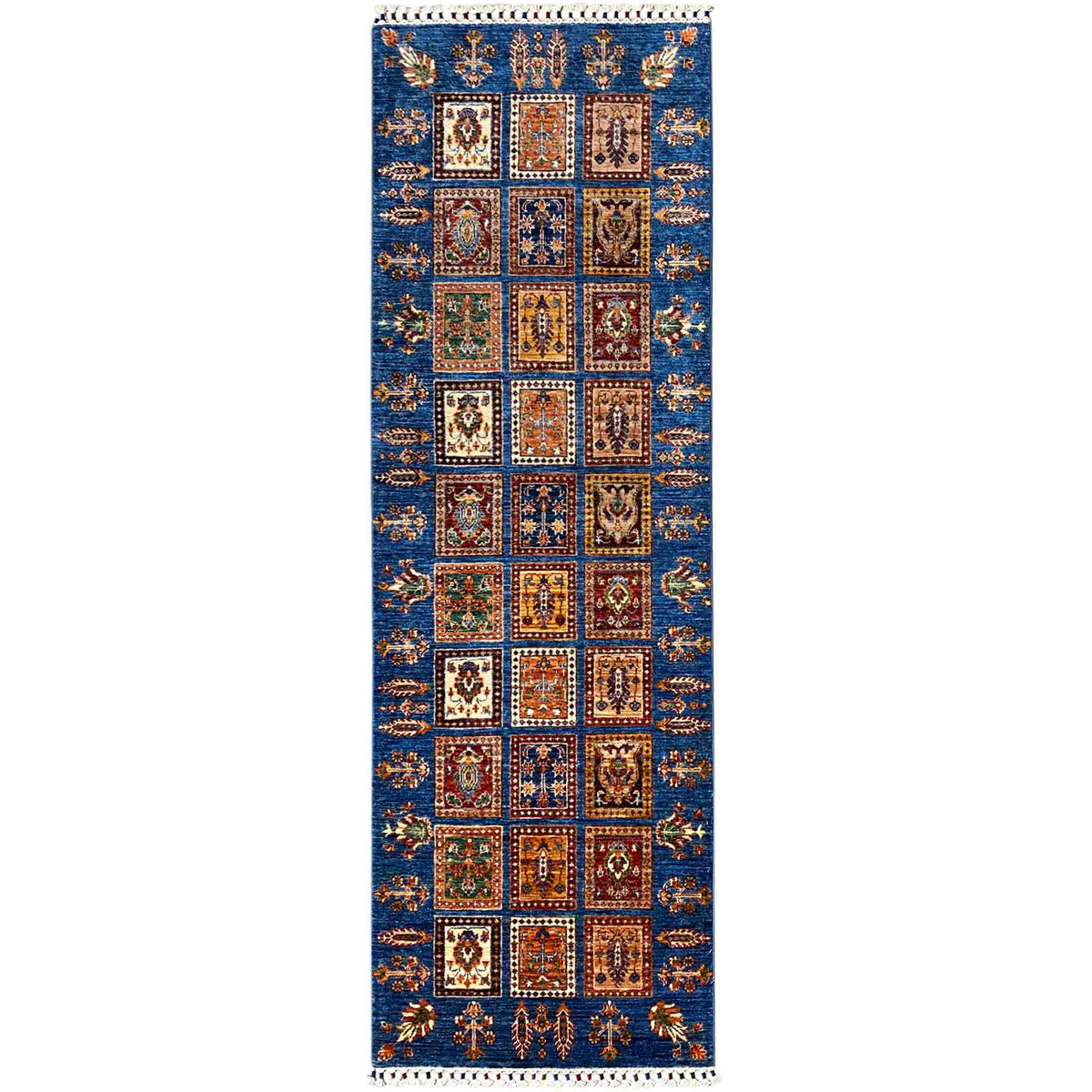 Runner rug with blue panel design and ornamental squares, with fringes