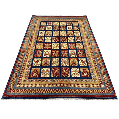Khorjin rug, rectangular, patchwork pattern with diamond frames and border in dark blue, red, and beige