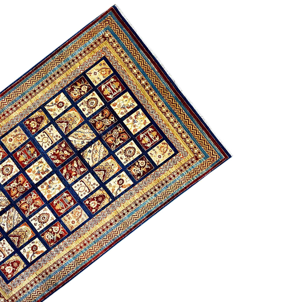 Khorjin rug at an angle, central patchwork grid with diamond frames, borders in blue, red, and beige