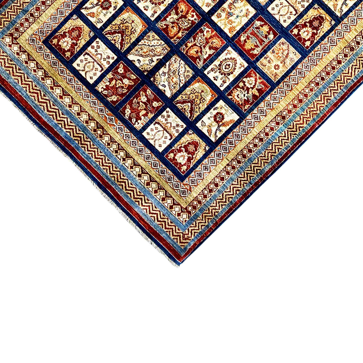 Khorjin rug detail: border trim with diamond lines, square pattern in dark blue, red and beige