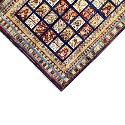 Khorjin rug detail: border trim with diamond lines, square pattern in dark blue, red and beige