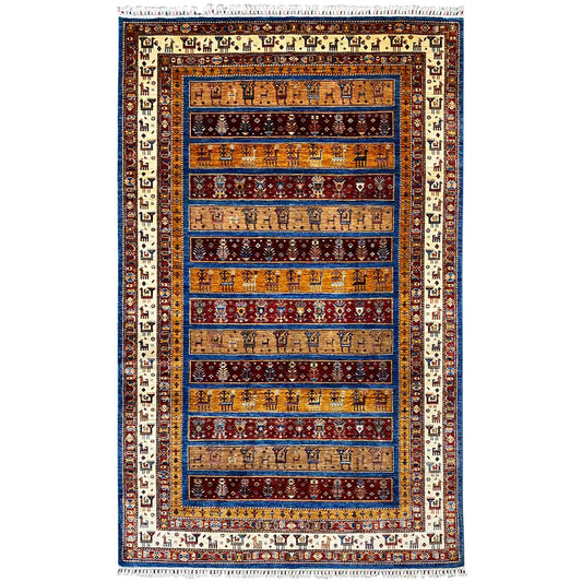 Rug with a tribal animal and geometric pattern in blue, red, and beige
