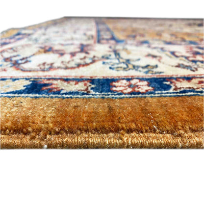 Khorjin carpet, detailed close-up: pile and fringe, orange-brown with a blue pattern