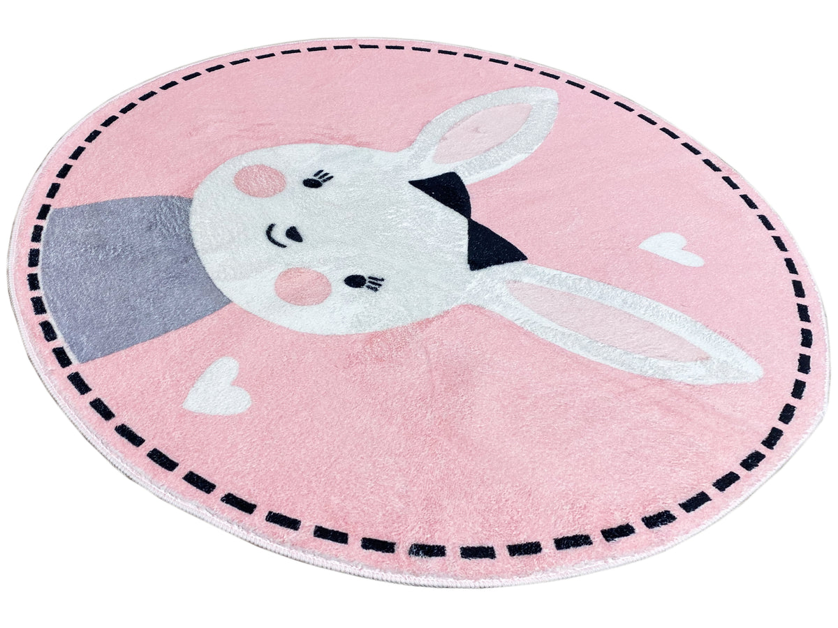Runder Kinderteppich mit liegendem Hasenmotiv, rosa Hintergrund, Herzchen und Ziernaht
