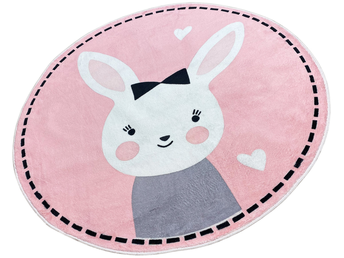 Runder Kinderteppich mit Hasengesicht und Fliege, rosa Grund, weiße Herzchen