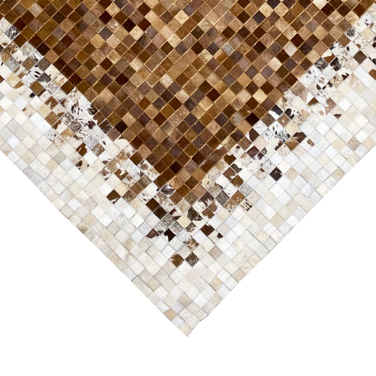 Calfskin rug detail view: brown square pattern with light accents