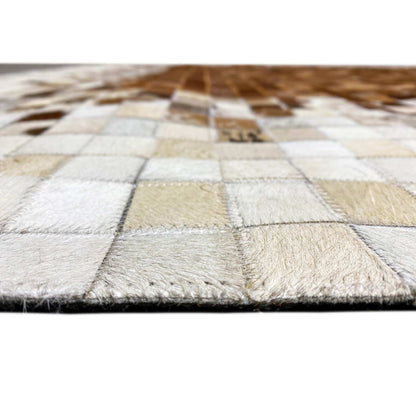 Close-up of the edge of the calfskin rug: thick padding, light brown grid