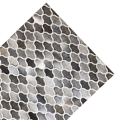 Calfskin rug with a diagonal view, geometric grid in gray and white