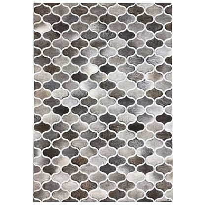 Calfskin rug with a geometric grid pattern, trimmed in gray-brown and white