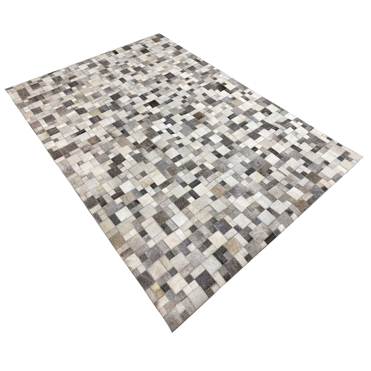 Calfskin rug with an offset tile pattern, predominantly gray and cream with dark accents