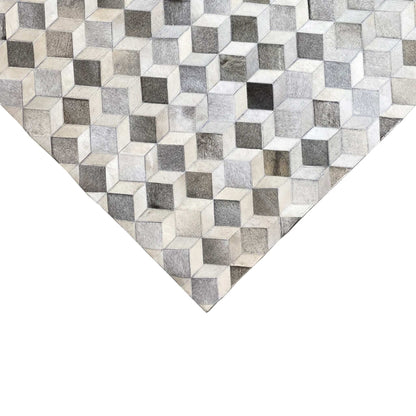 Carpet corner with a cube pattern made of light and dark gray areas