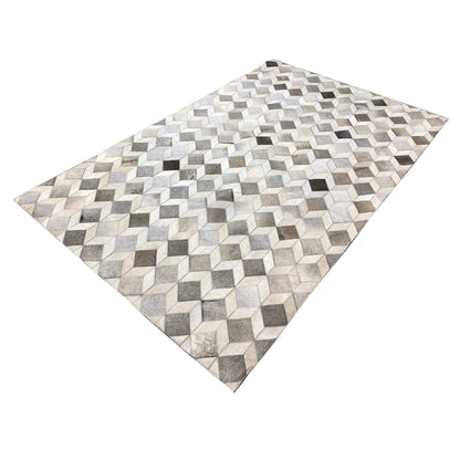 Rug with a cube pattern in light gray tones and beige areas