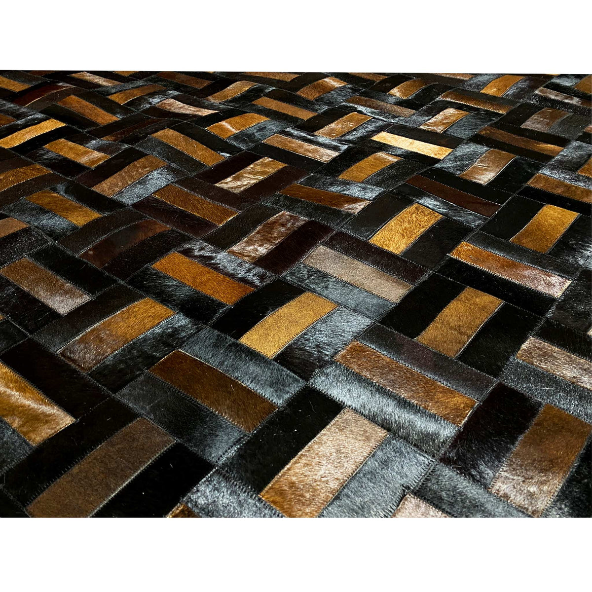 Leather rug close-up: inlaid leather squares in black and brown