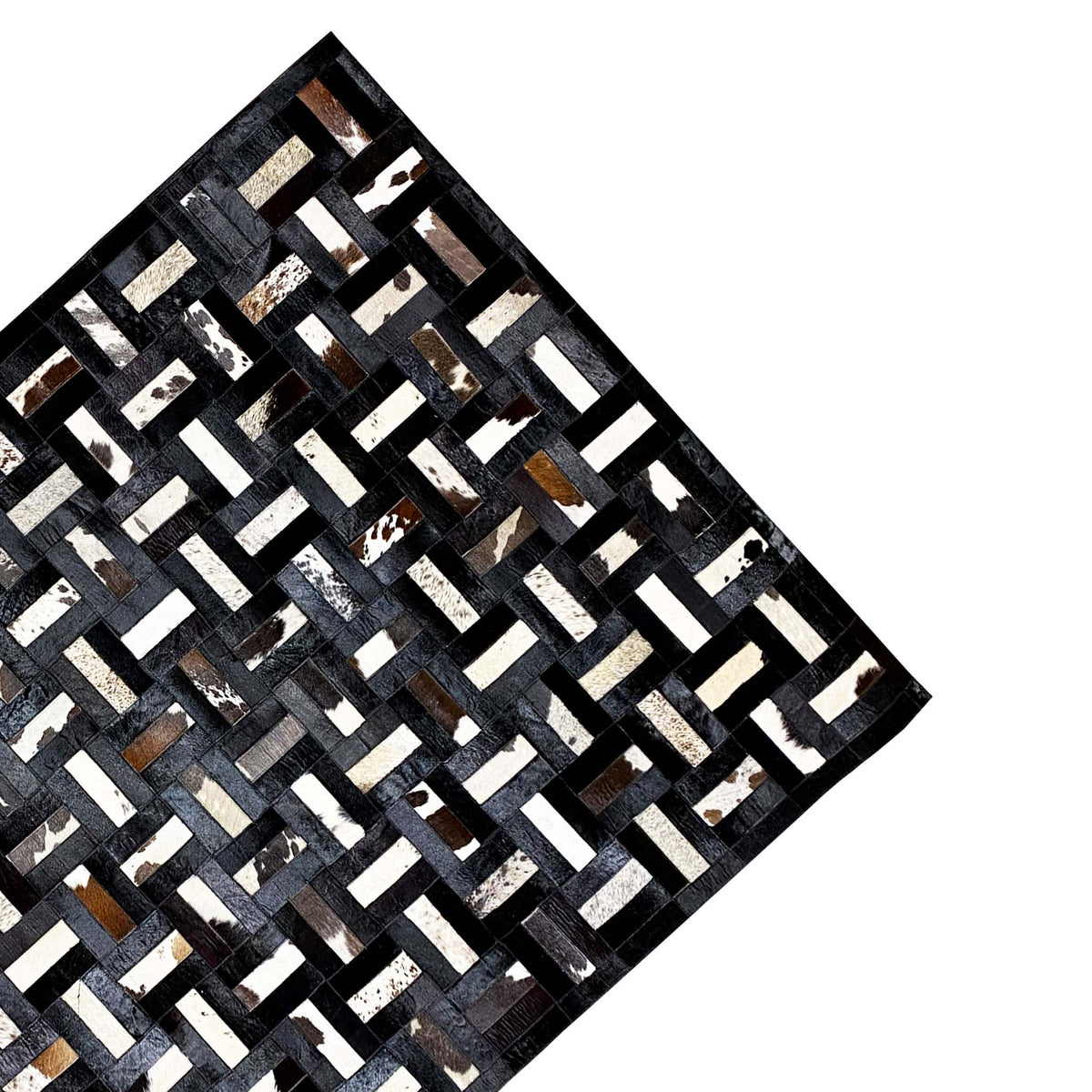 Geometric calfskin rug, diagonal view, black and gray with white block stripes