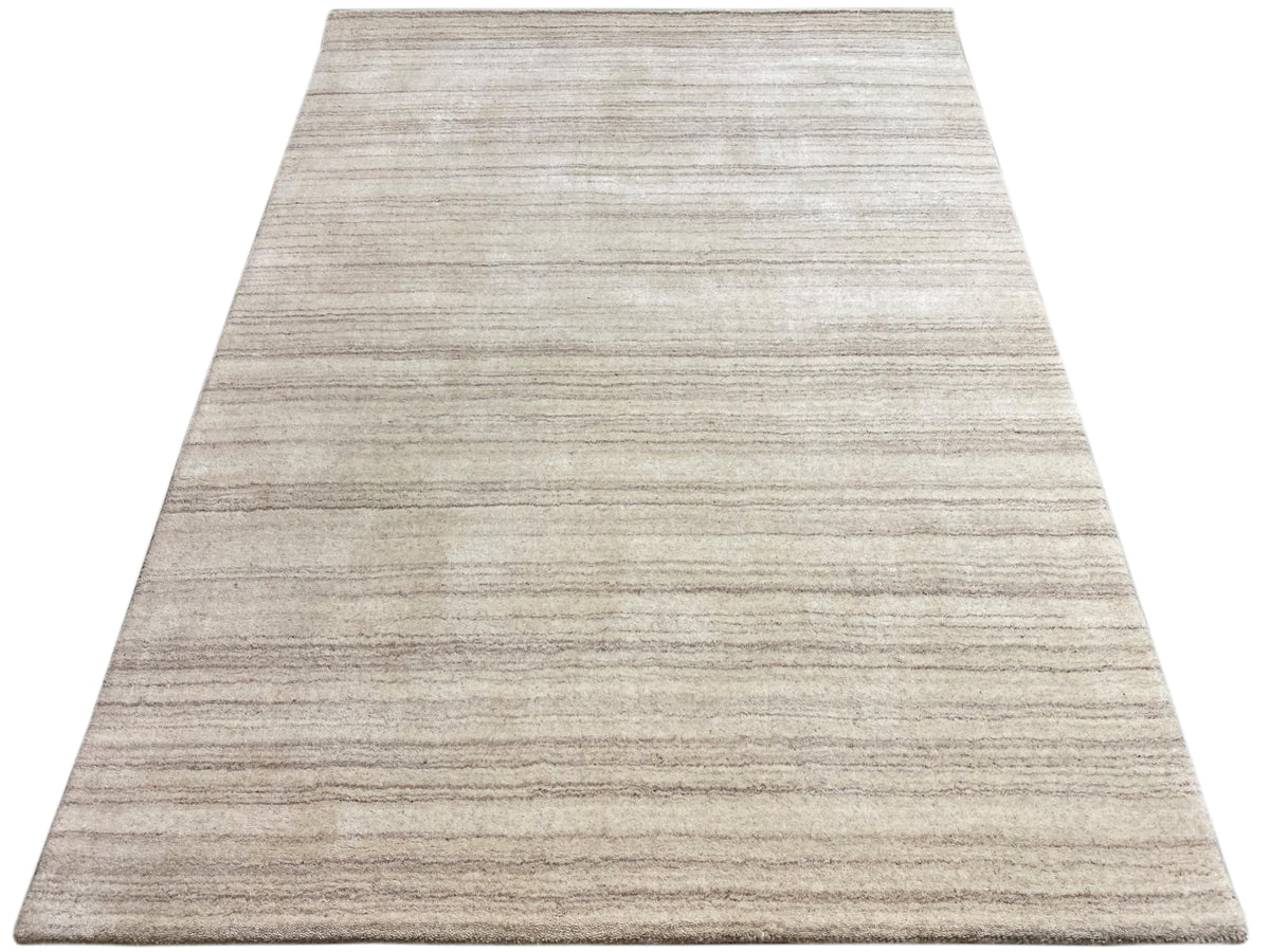Rectangular rug with a beige base and fine stripes in a linear pattern
