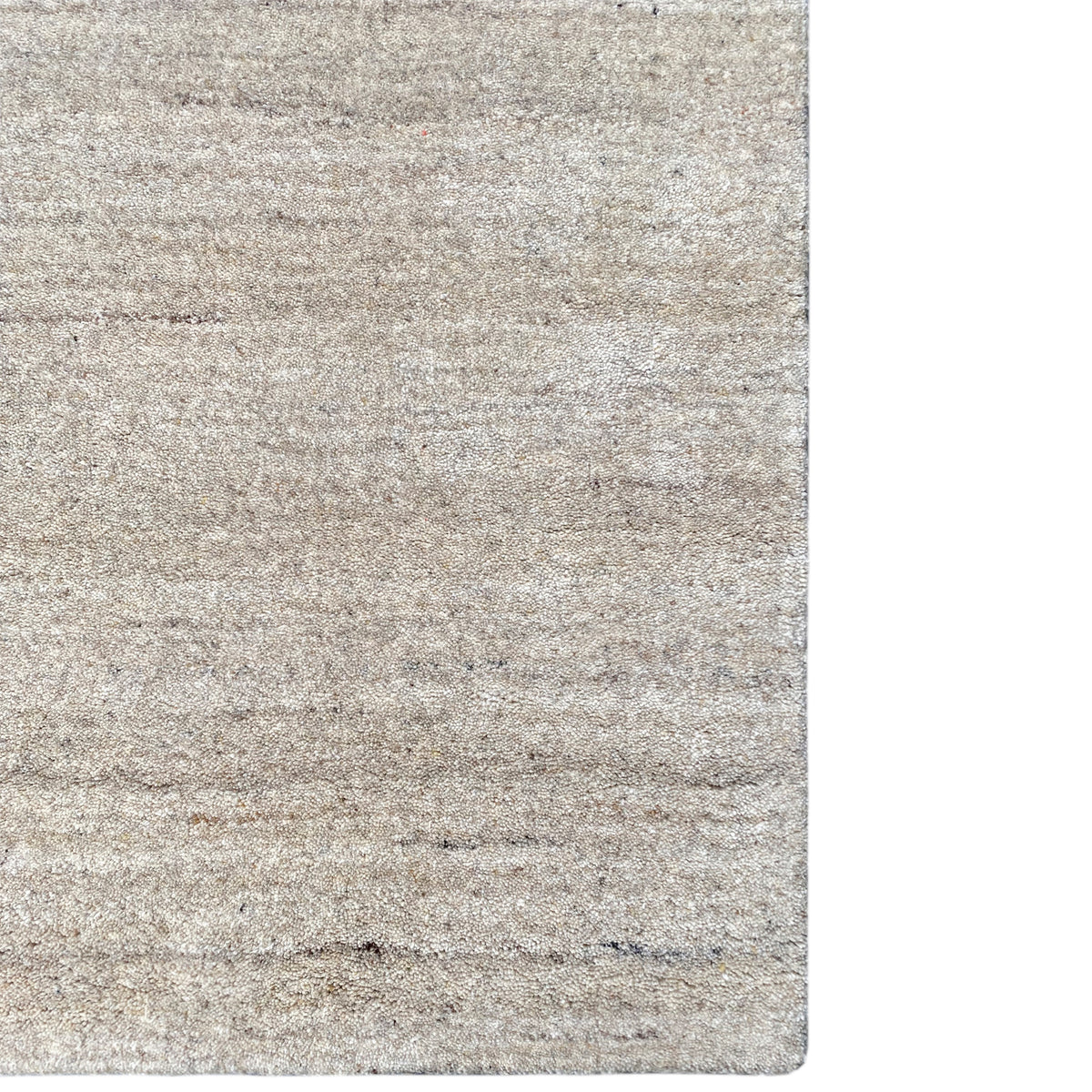 Beige Gabbeh rug with a dense, mottled texture and irregular pattern, 202×143 cm