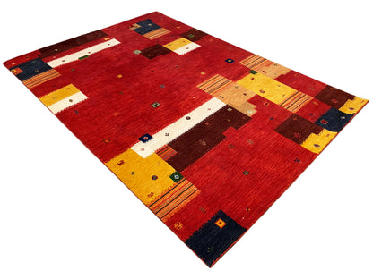Loom Luri Teppich, rot-buntes Patchwork mit gelben, weißen Rechtecken und dunkelblauen Akzenten