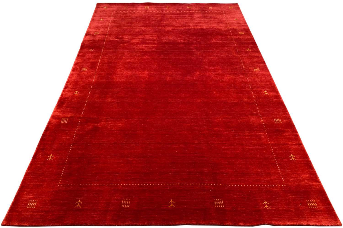 Red rug with a wide central section and subtle ornamental border, rectangular