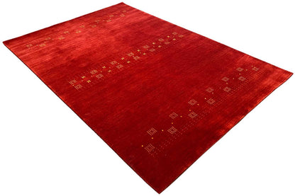 Red carpet with continuous diamond and line patterns, diagonal