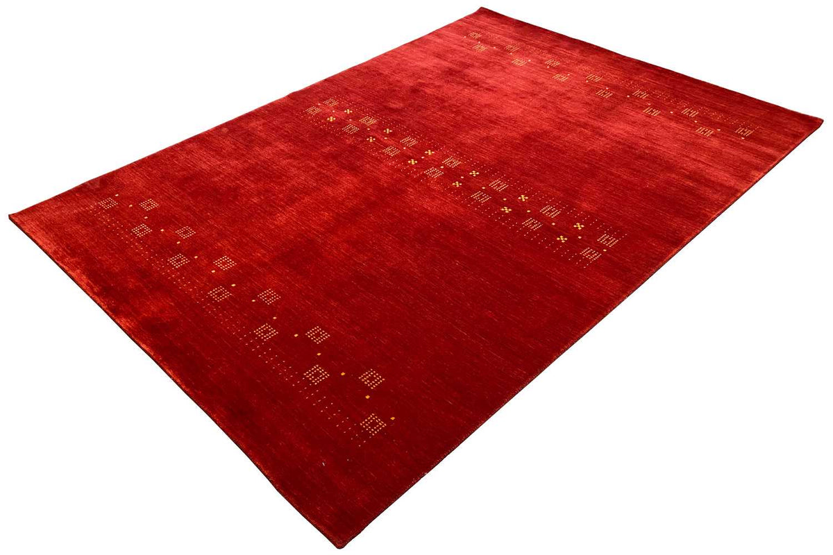 Red carpet with fine patterns across the entire surface, angled