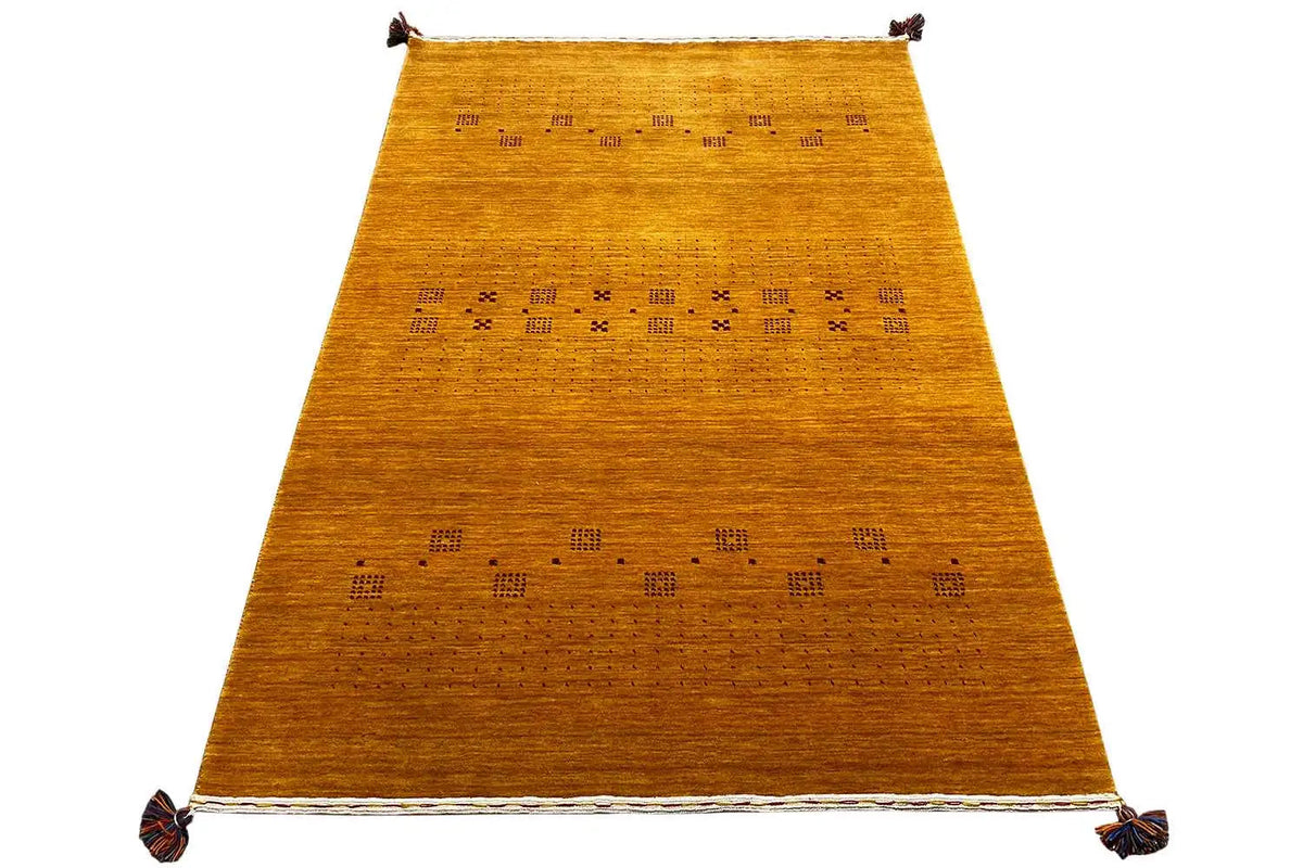 Gabbeh loom rug with parallel patterns and tassels at the corners
