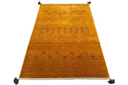 Gabbeh loom rug with parallel patterns and tassels at the corners