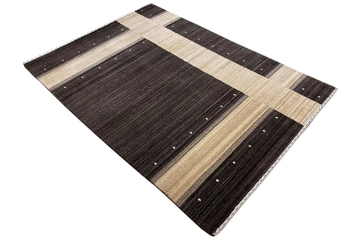 Carpet in the corner: dark squares with beige stripes and delicate light dot accents