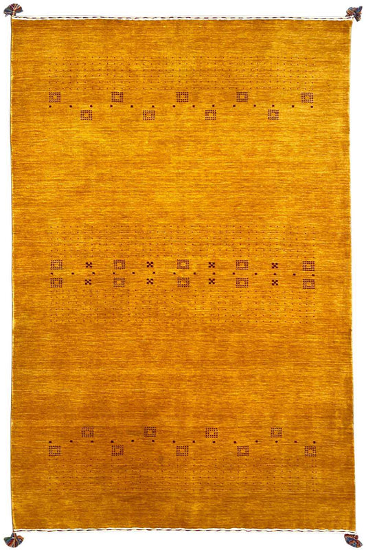 Honey-brown Gabbeh rug with a geometric pattern and fringe at the corners