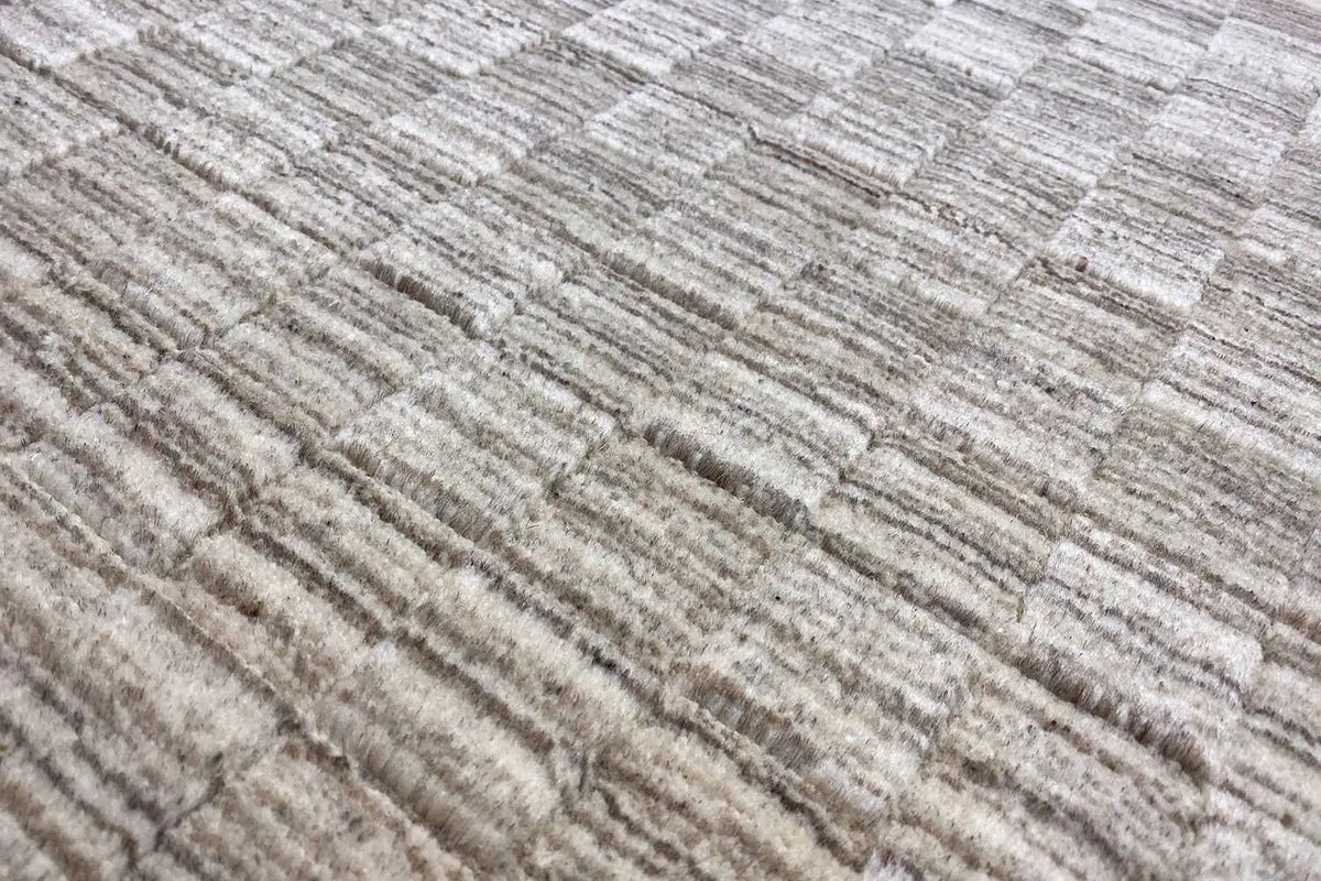 Carpet surface in detail: floral pattern of light and gray longitudinal lines
