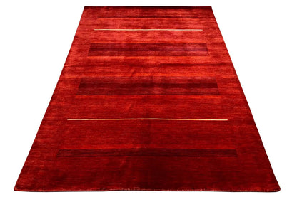 Red Gabbeh rug, open at the top; patterned striped look in the pile