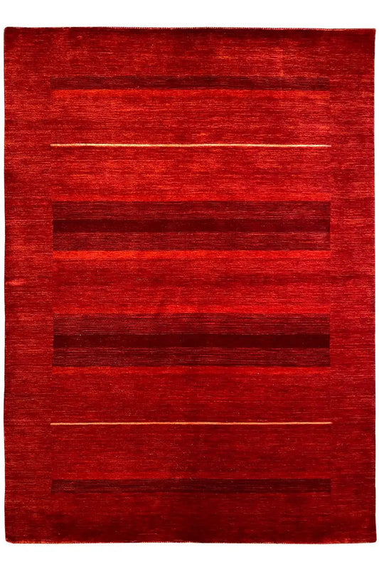 Gabbeh rug with rectangular zones and narrow lines in shades of red, front view
