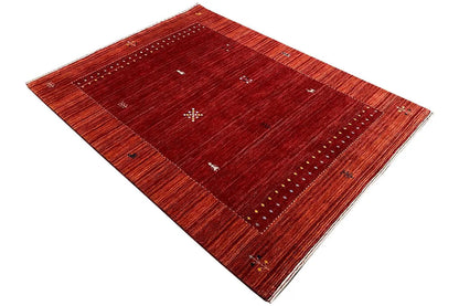 Gabbeh rug, reddish-brown border and central field with dot motifs