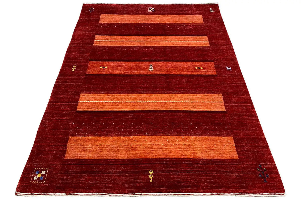 Gabbeh rug, broadly textured pile in red with several orange rectangular stripes