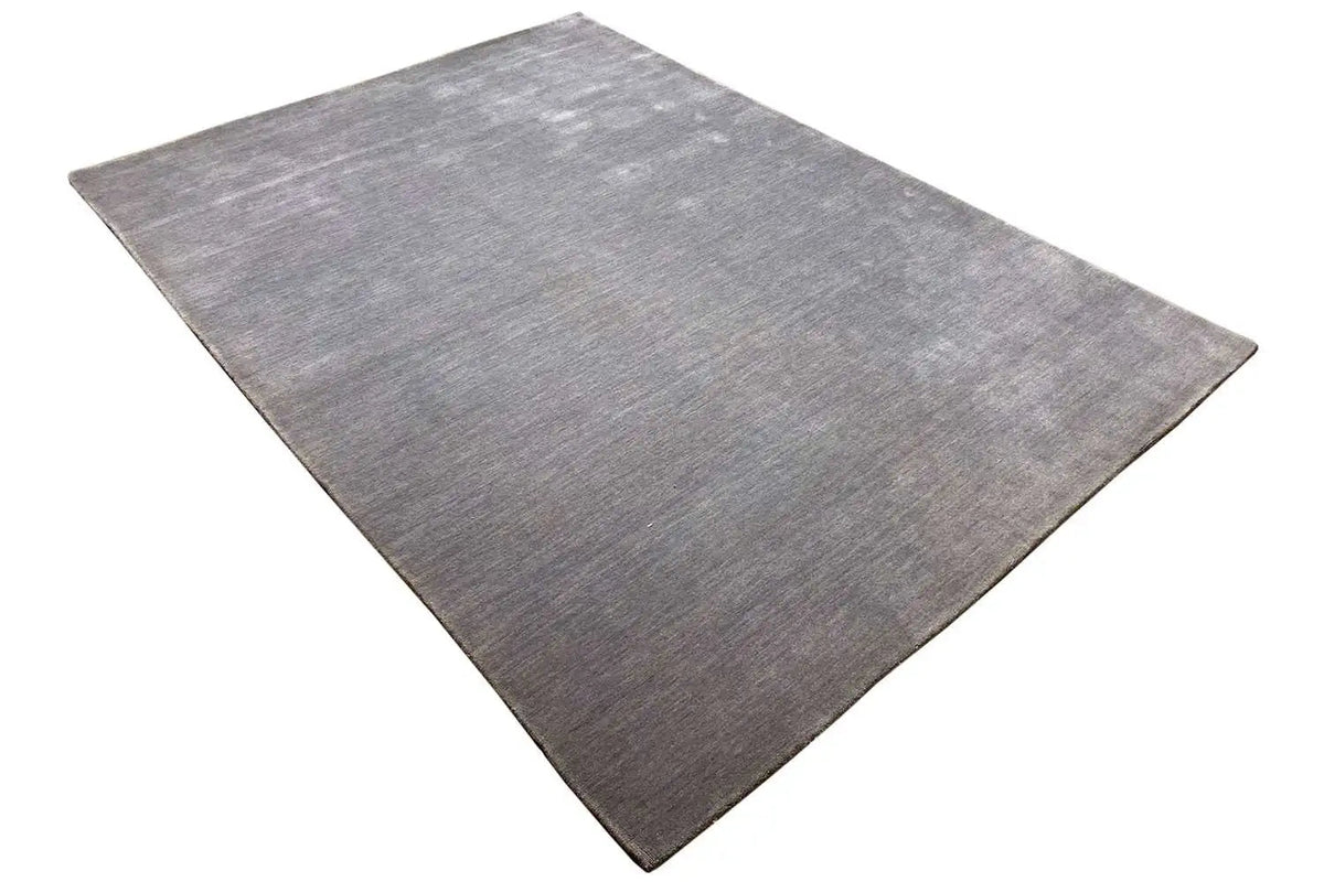 Gabbeh rug (240x170 cm), rectangular, mottled gray, diagonally oriented view