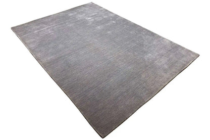 Gabbeh rug (240x170 cm), rectangular, mottled gray, diagonally oriented view