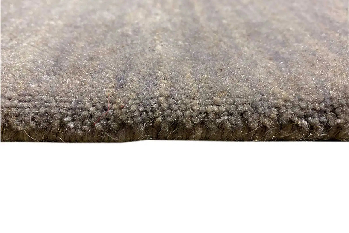 Gabbeh rug, light to medium gray, close-up of the lower pile finish