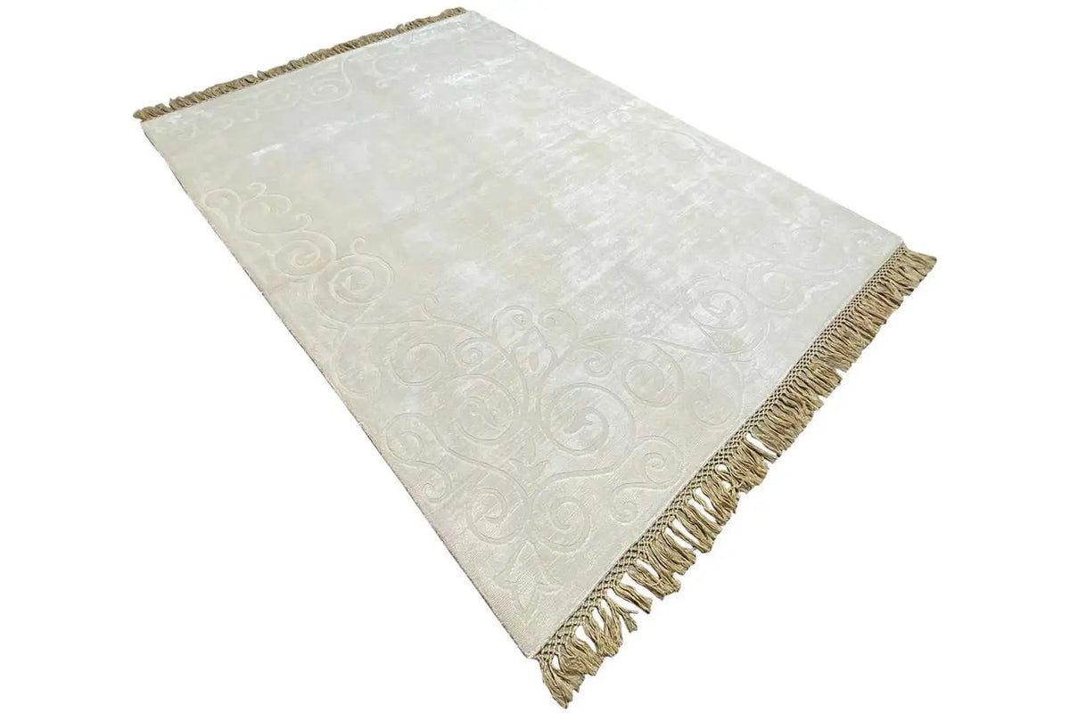 Gabbeh rug 224x170 cm, cream, diagonal view with fringes along the edges