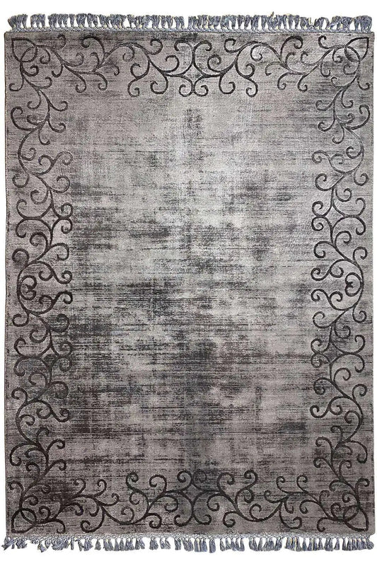 Gabbeh rug with a gray pattern and dark border, fringes along the edge