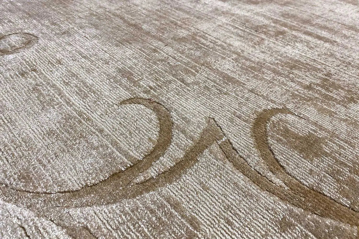 Gabbeh rug, close-up of the woven vine line in brown on a light background