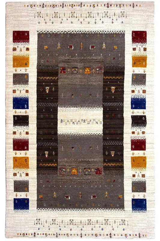 Rug with a light border, dark central sections, and colorful tiles