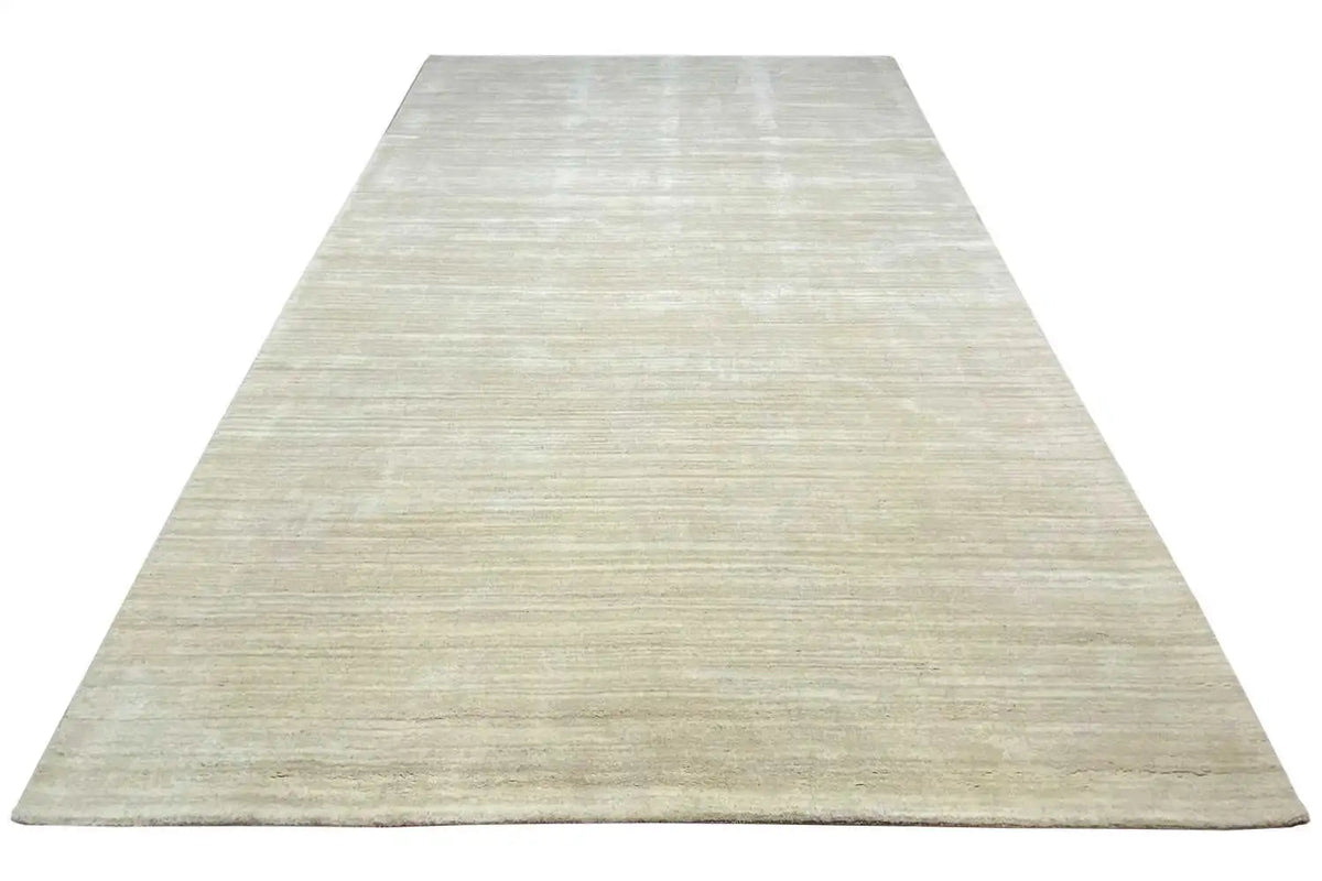 Beige Gabbeh rug with a fine woven pattern, wide top view