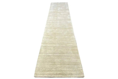 Beige runner with straight edges and an even, fine weave texture