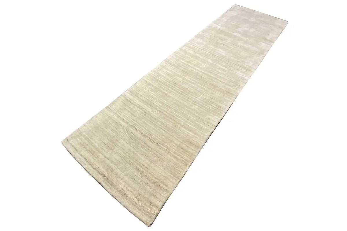 Beige runner with clean edges and a dense pile texture