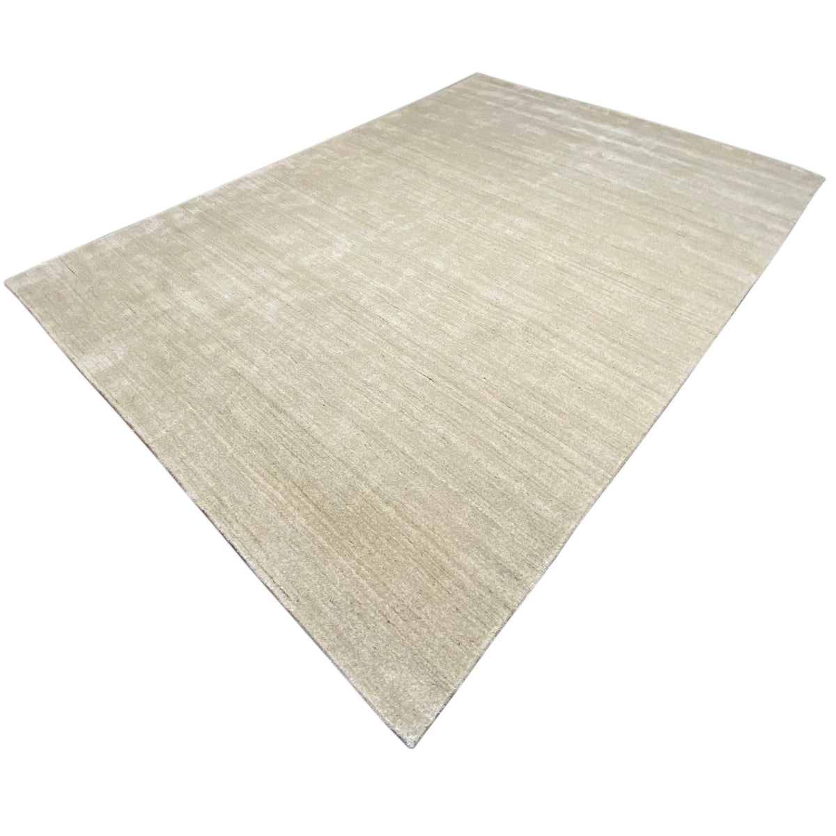Beige carpet with a diagonal perspective and a dense, even texture