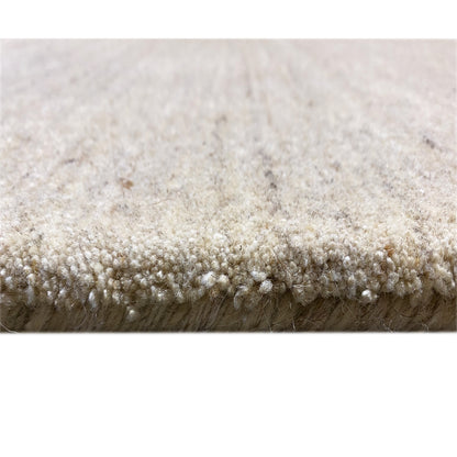 Carpet edge with a short pile: beige, dense pile on the underside