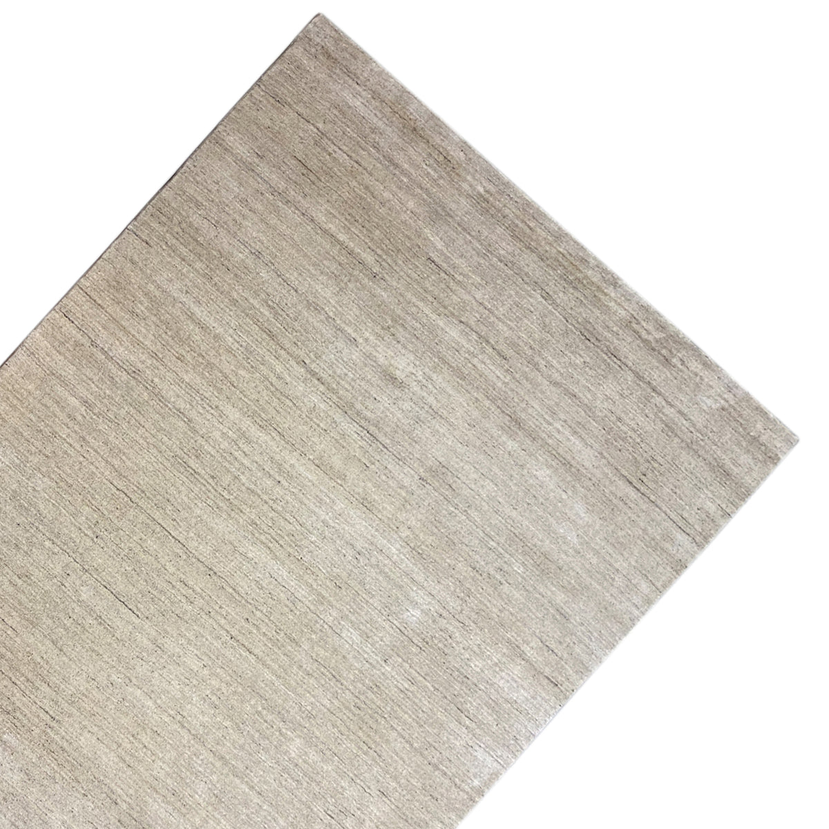 Beige carpet viewed at an angle, smooth short-pile surface with a fine linear pattern