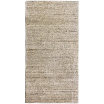 Rectangular rug, beige mottled pile with a subtle linear pattern
