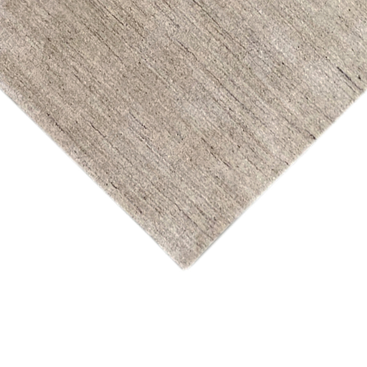 Corner and pile texture of the beige carpet, fine lines in the weave