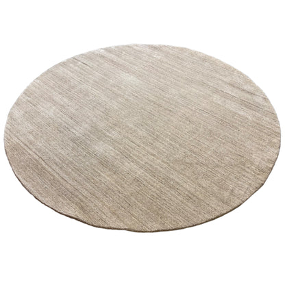 Round rug with a mélange effect in light beige and gray, even woven texture