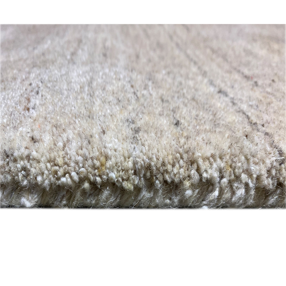 Close-up of the carpet edge with short, densely packed fibers
